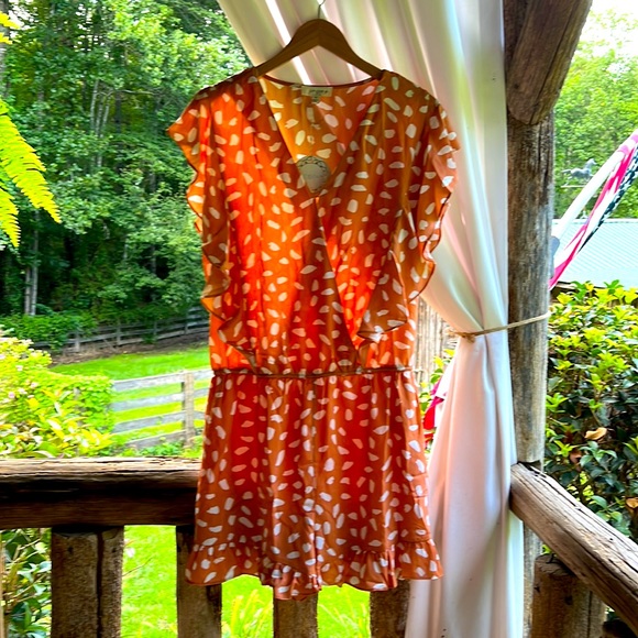 Umgee Pants - UMGEE NWT ANIMAL PRINT ROMPER IN THE COLOR OF SALMON AND WHITE